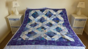Quit as shown on a double bed.